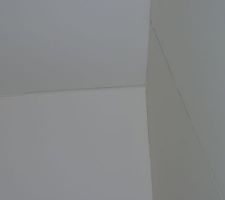 Fissures mur/plafond mezzanine .