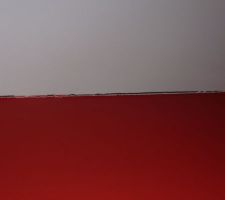 Fissures plafond/mur chambre RDC.