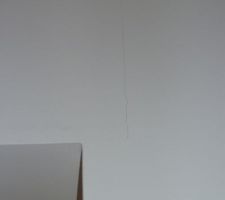Fissures mur chambre RDC.