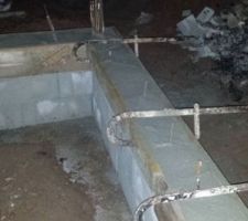 Beton coulé dans parpaings a bancher