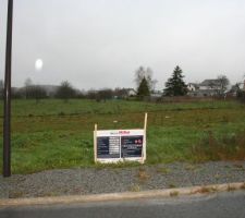 Pose du panneau du permis de construire.