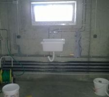 Pose du vidoir dans la cave.