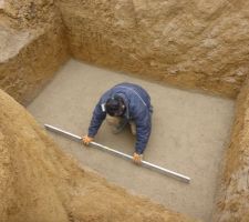 Mise à niveau du lit de sable pour la cuve d'EP