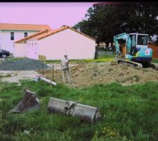 Tracto-pelle en action