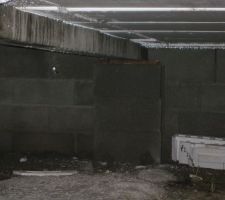 Poutre BA repose sur des parpaings