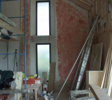 Pose parquet collé sur le plâtre couvert d'un primaire d'accrochage. Le platre permet l'étancheité à l'air.