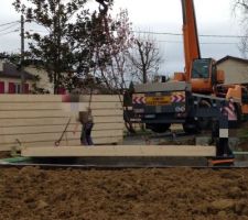 Pos&eacute; de la premi&egrave;re dalle