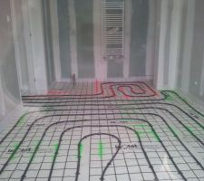 Plancher chauffant chambre du RDC salle d'eau attenante