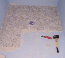 Pose des galets sur le receveur de douche