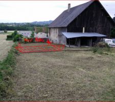 Creuser de la dalle béton pour atteindre le niveau du bas du muret, au fond