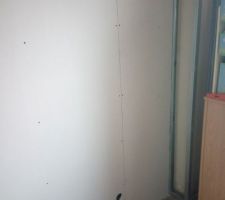Photo du montage d'une cloison avec Optima