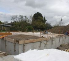 Mise en place des planches avant de couler la dalle