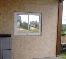 Fermeture d'un coté de la terrasse couverte