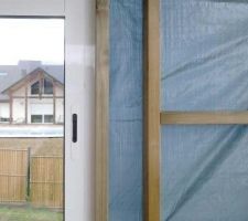 Fermeture d'un coté de la terrasse couverte