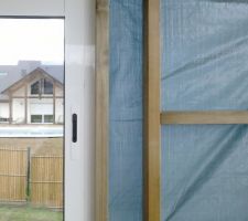 Fermeture d'un coté de la terrasse couverte