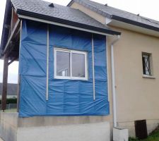 Fermeture d'un coté de la terrasse couverte