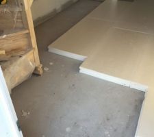 Pose de l'isolant avant le plancher chauffant