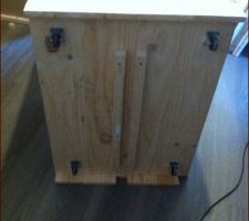 Les roulettes et rail en dessous du caisson