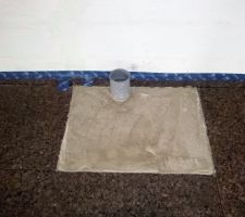 Traitement en béton su sol qui recevra le montage Gébérit : à la demande du plombier