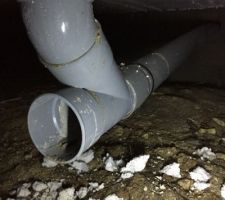 Évacuation douche pliée mais pas cassée