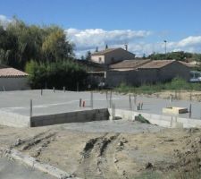 Dalle coulée pour le vide sanitaire avec accès par le garage