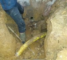Vidage du vide sanitaire et raccordement du drain et des gouttiere au reseau communal