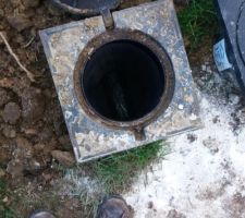 Vidage du vide sanitaire et raccordement du drain et des gouttiere au reseau communal