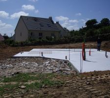 Vide sanitaire de 2 rangs finis avec dalle coulée, et drainage fait.
