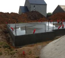 Dalle coulée malgré la pluie