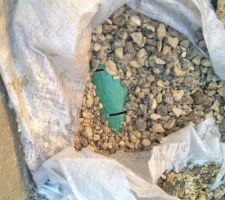 Drain routier + cailloux + geotextile