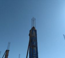 Coulage des poteaux au seau