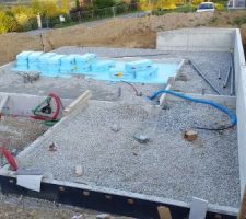 Installation de l'isolant de type polystyrène extrudé Roofmat sous dallage 5