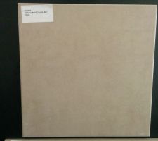 Carrelage Point Climate taupe 31x31 pour la salle de bain.