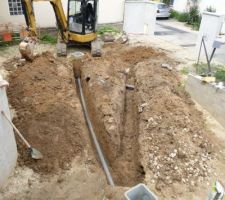 Branchement d'un trop-plein du puisard le plus proche de la maison vers l'autre.