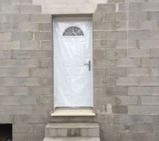 Pose des fenêtres, porte d'entrée et porte-fenêtre