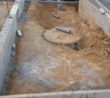 Creusage autour du puits pour qu'il soit accessible plus facilement depuis le vide sanitaire