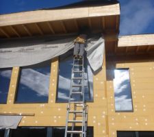 Mise en place de la protection pare pluie provisoire