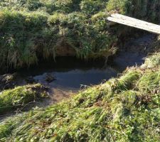 Canalisation eau usée exposée par crue un an après fin travaux