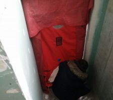 Installation de la porte soufflante dans le garage