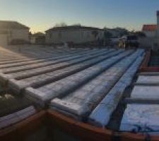 Préparation du plancher et couché de soleil sur la terrasse