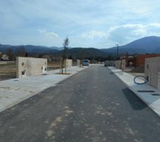 Mise en place des arbres près des places de stationnement et crépi des murs de propriété