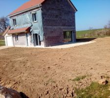 Remise des terres en place