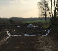 Terrassement et mise en place des gravats pour l'accès chantier