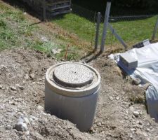 Rehausse tout à l'égout afin de remonter le niveau de terre