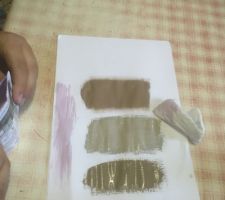 Peinture violette pour la partie cuisine ( 1 pan de mur demi cloisonné ) 

Peinture n? 1 en haut marron retenu pour le
Séjour . Le pan de mur salon aussi cloisonné sera peint couleur beige / marron à paillette .