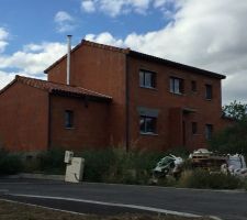 Conduit de cheminée et gouttières posées