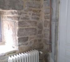 Mur exterieur buanderie jointé
et radiateur en place