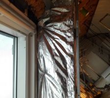 Isolation avec film multicouche en dessous et fibre de bois