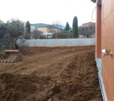 Remblaiement partiel et remise en forme du terrain