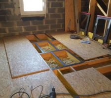 Pose des entretoises;laine de verre;bande r&eacute;silience et plancher